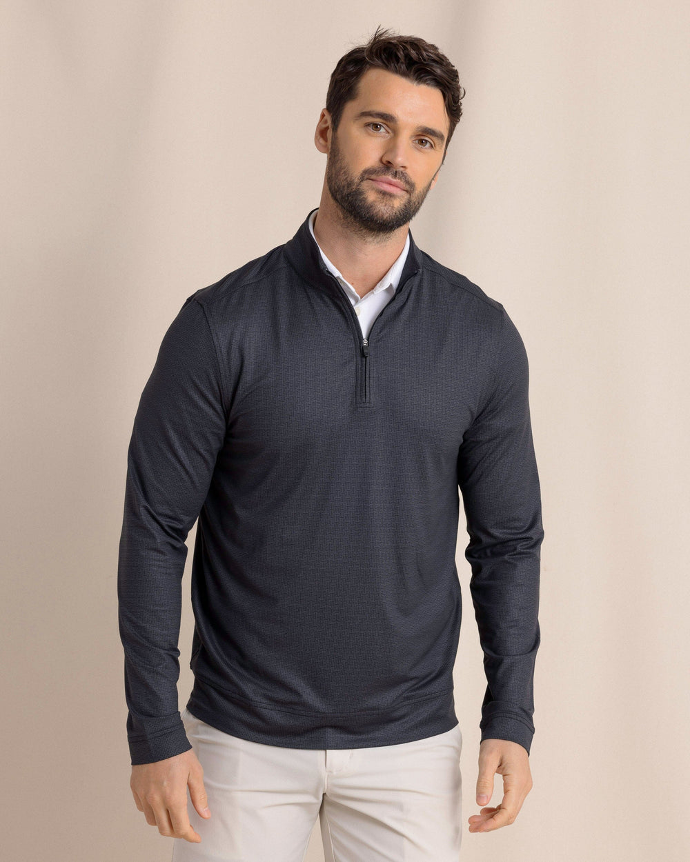 The front view of the Southern Tide Cruiser ST Geo Printed Quarter Zip by Southern Tide - Caviar Black