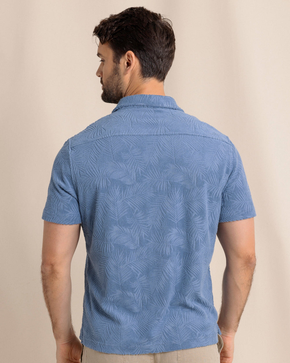 The back view of the Southern Tide Crystal Beach Terry Short Sleeve Camp Shirt by Southern Tide - Coronet Blue