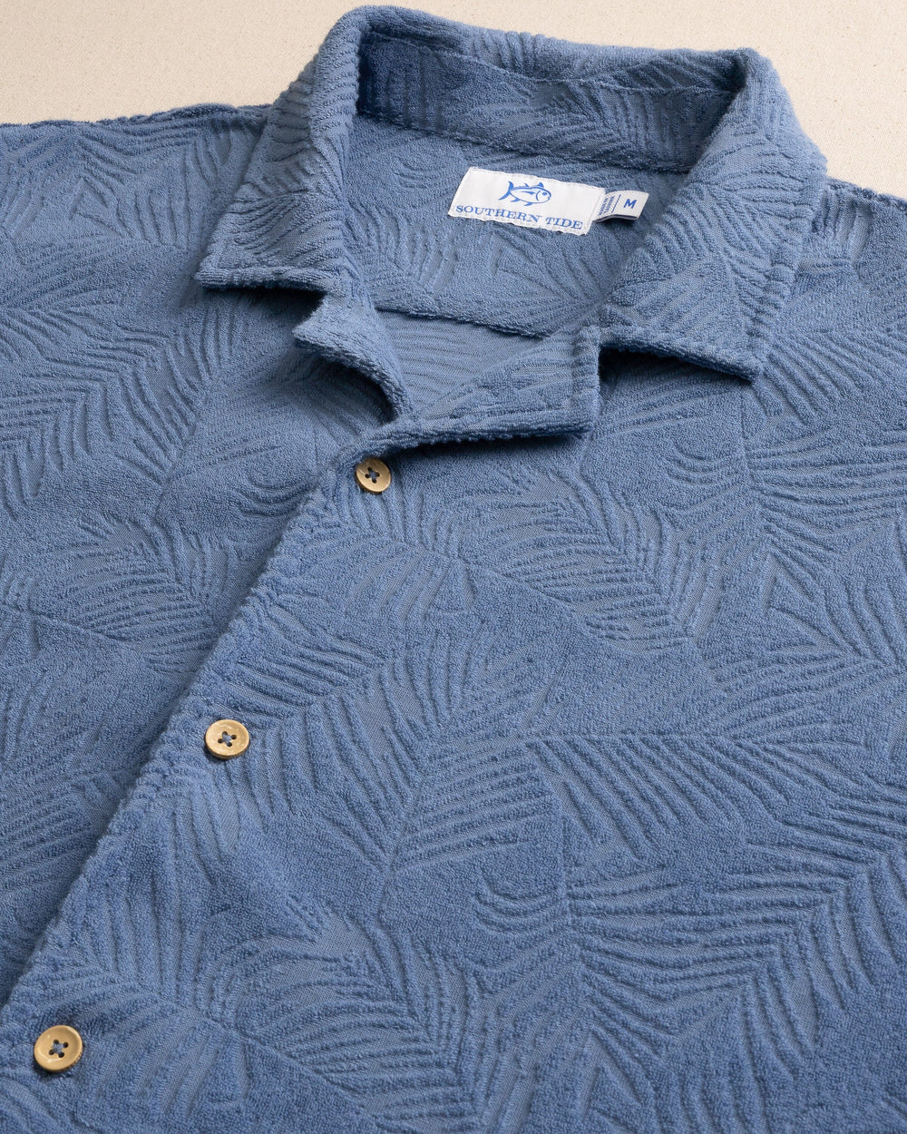 The detail view of the Southern Tide Crystal Beach Terry Short Sleeve Camp Shirt by Southern Tide - Coronet Blue