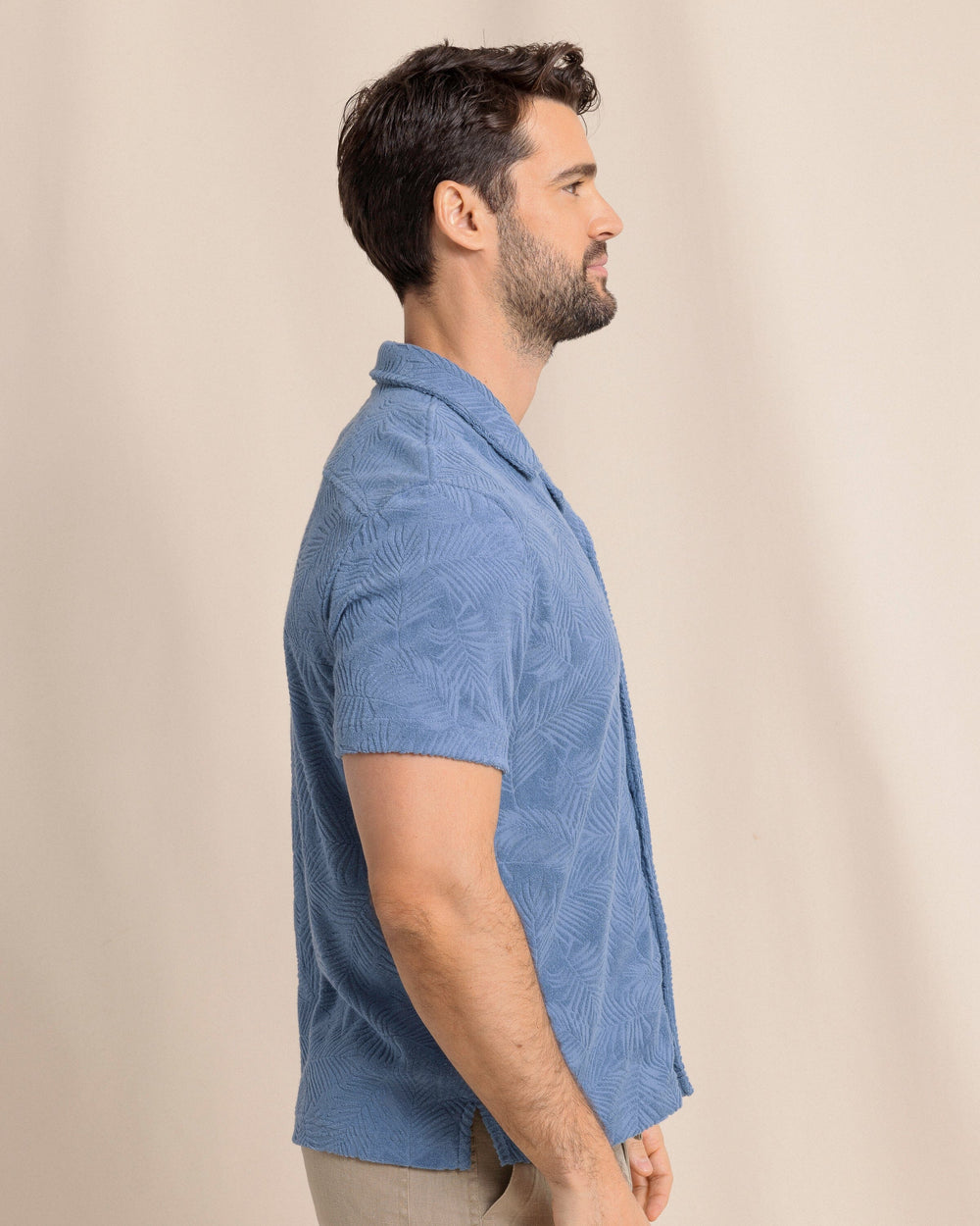 The side view of the Southern Tide Crystal Beach Terry Short Sleeve Camp Shirt by Southern Tide - Coronet Blue