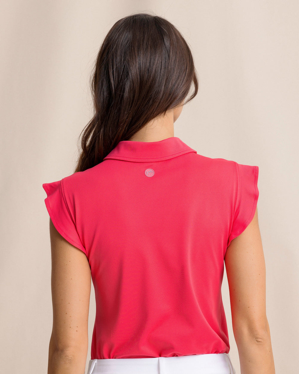 The back view of the Southern Tide Dayna Active Ruffle Polo Tank by Southern Tide - Calypso Berry