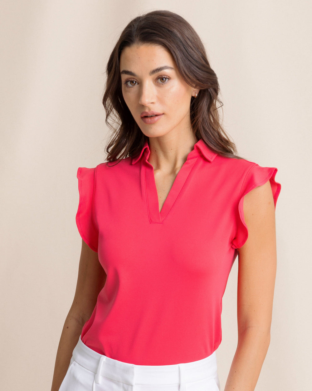 The front view of the Southern Tide Dayna Active Ruffle Polo Tank by Southern Tide - Calypso Berry
