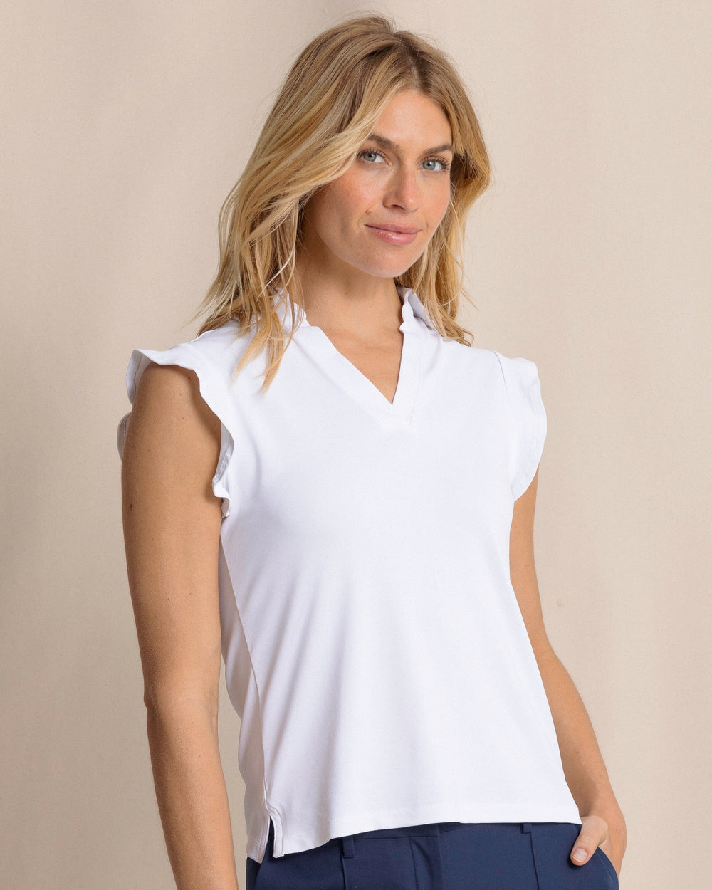 The front side view of the Southern Tide Dayna Active Ruffle Polo Tank by Southern Tide - Classic White