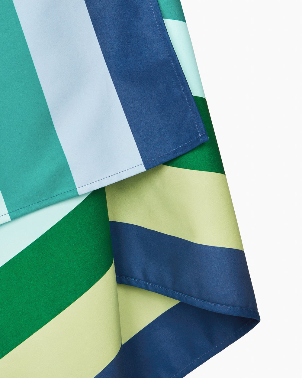 The detail view of the Southern Tide Dock & Bay Quick Dry Beach Towel by Southern Tide - Cool Lagoon Blue
