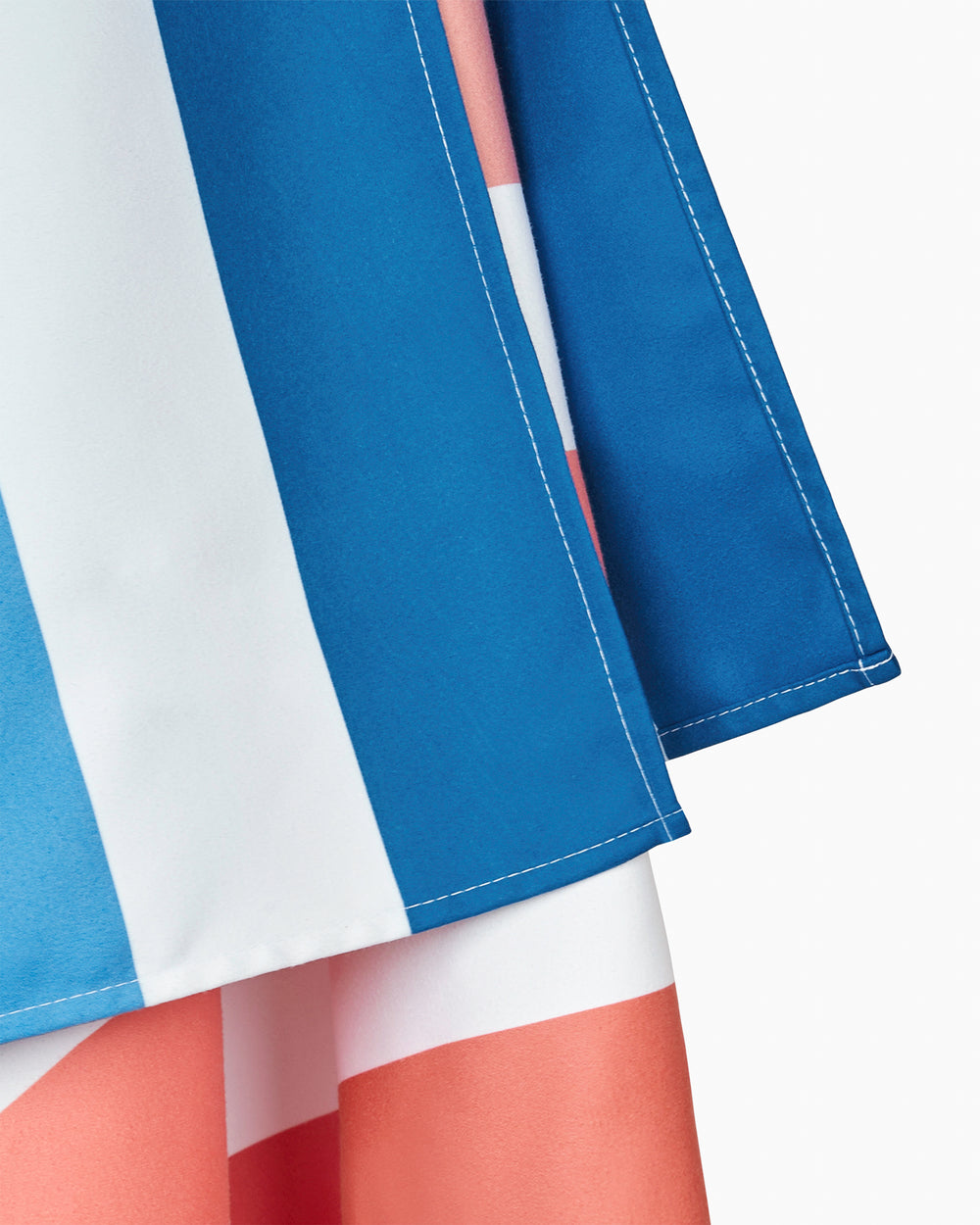 The detail view of the Southern Tide Dock & Bay Quick Dry Beach Towel by Southern Tide - Sand To Sea Blue