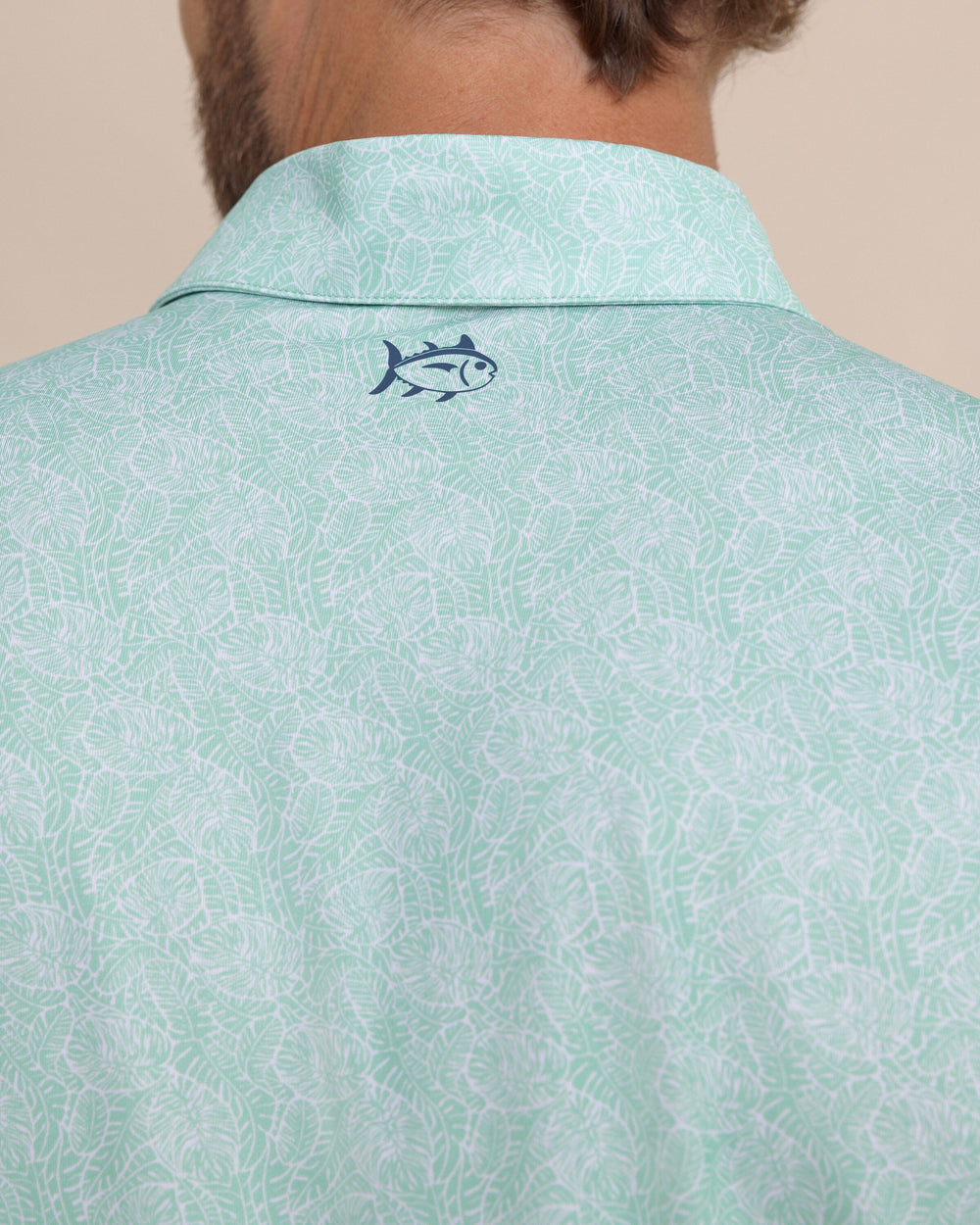 The detail view of the Southern Tide Driver Beach Palms Printed Polo by Southern Tide - Garden Grove