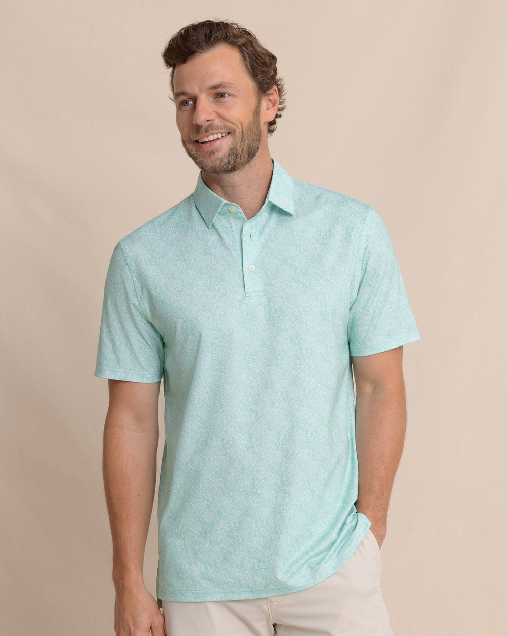 The front view of the Southern Tide Driver Beach Palms Printed Polo by Southern Tide - Garden Grove