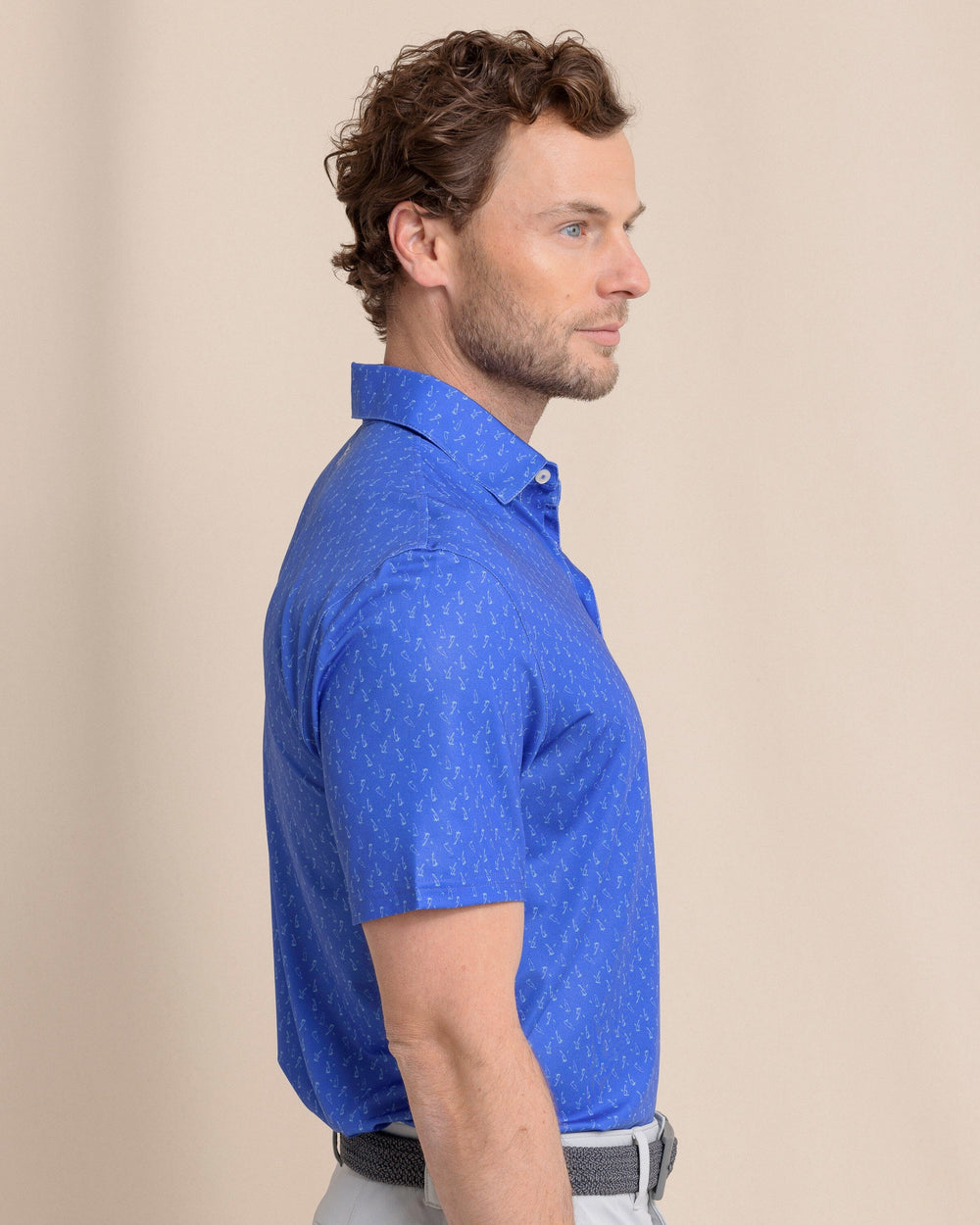 The side view of the Southern Tide Driver Beers Cheers Printed Polo by Southern Tide - Dazzling Blue