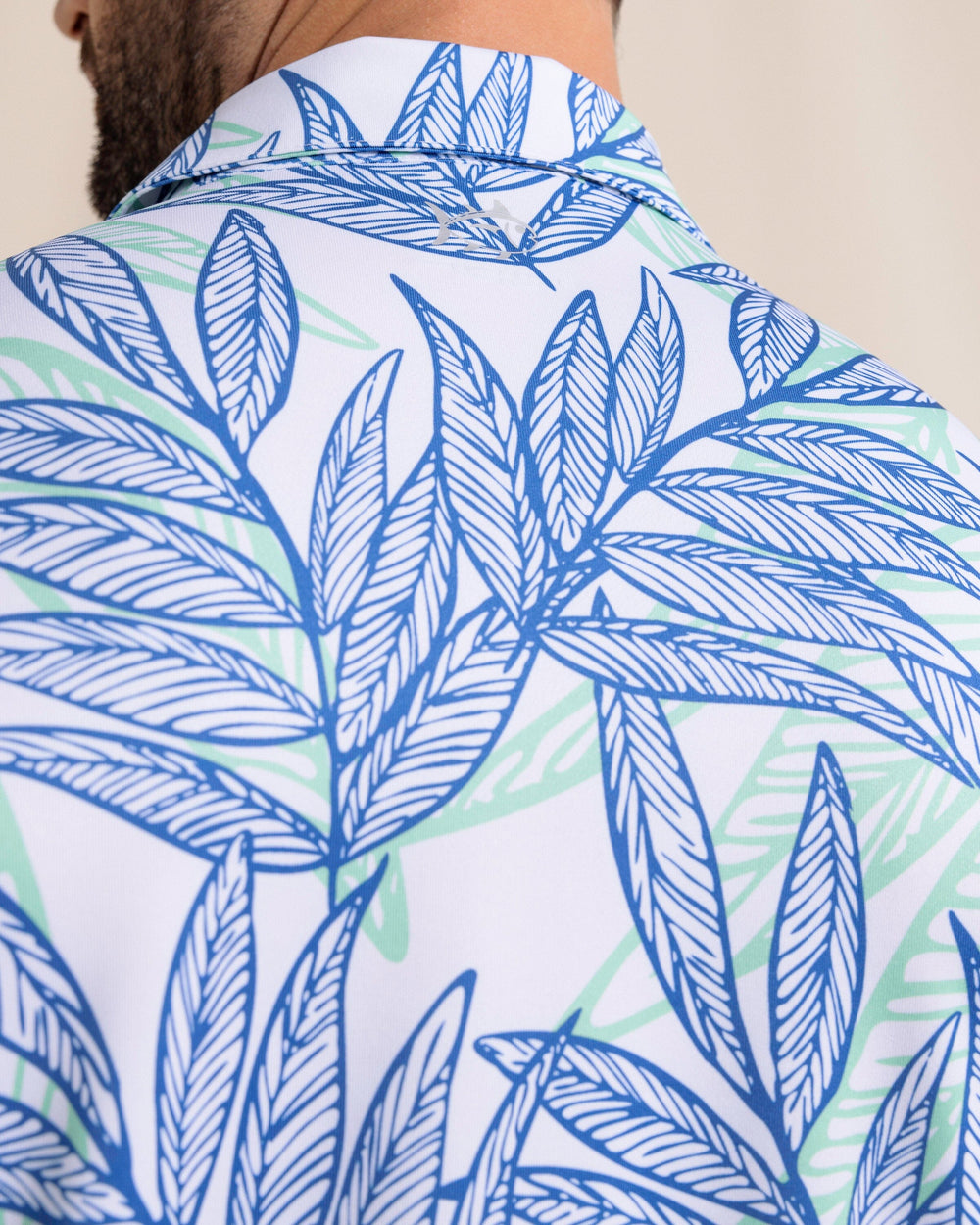 The back detail view of the Southern Tide Driver Blue Palms Polo by Southern Tide - Classic White