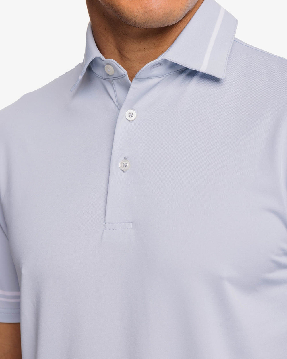 The detail view of the Southern Tide Driver Brantley Stripe Performance Polo Shirt by Southern Tide - Slate Grey