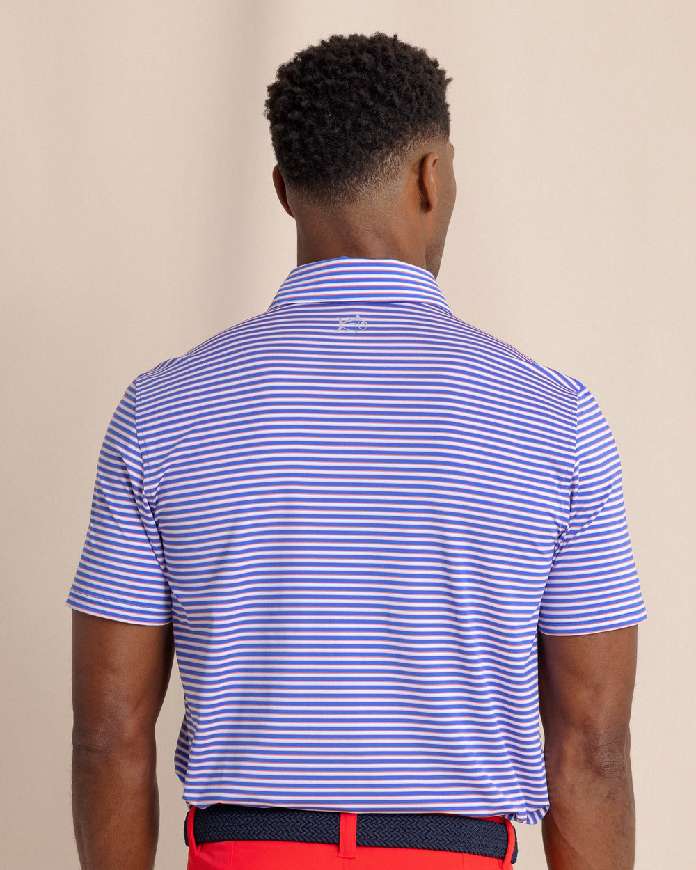 The back view of the Southern Tide Driver Caravel Stripe Polo by Southern Tide - Dazzling Blue