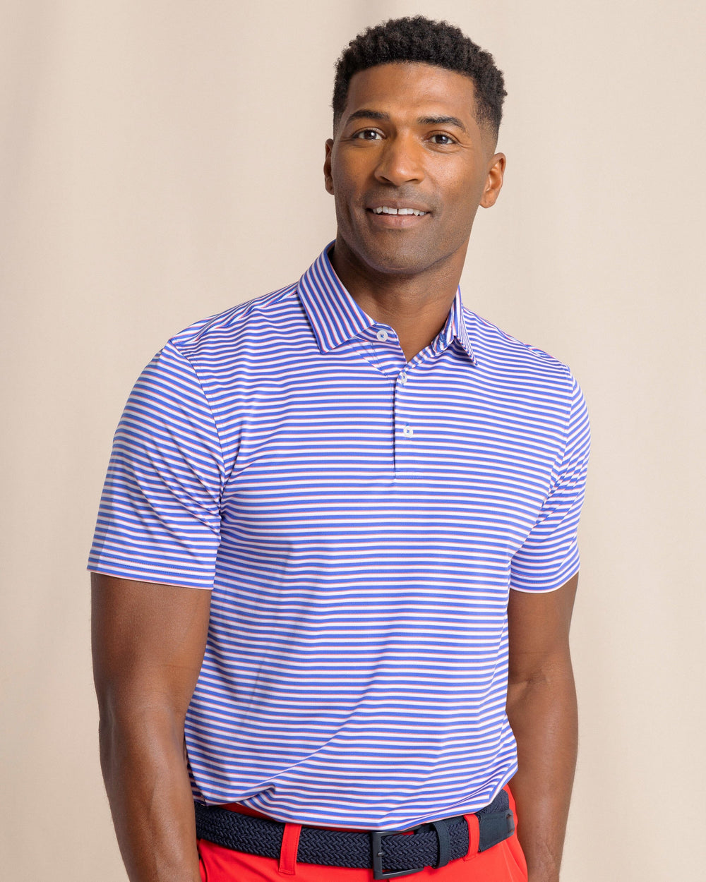 The front view of the Southern Tide Driver Caravel Stripe Polo by Southern Tide - Dazzling Blue
