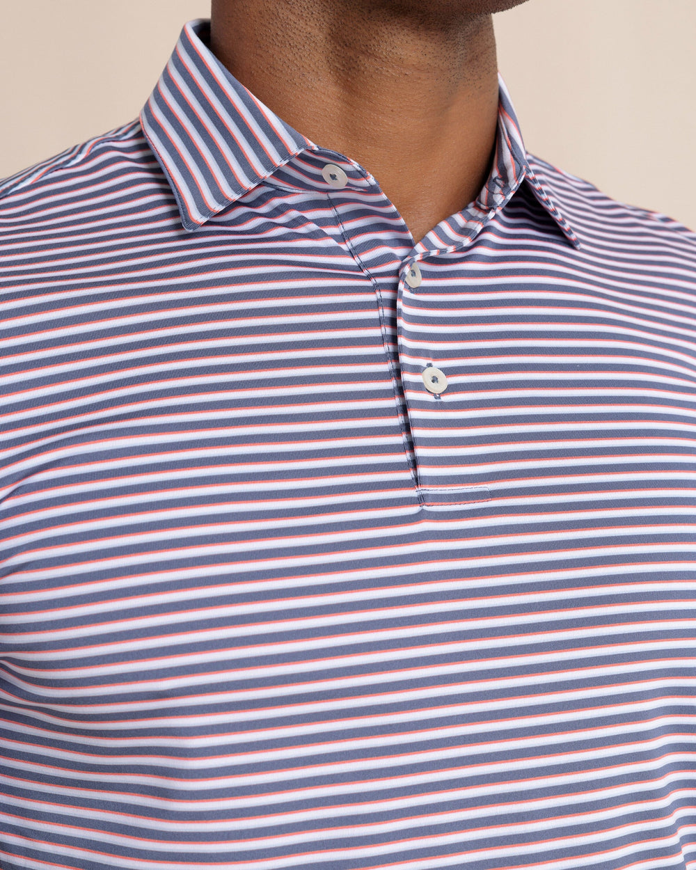The front detail view of the Southern Tide Driver Caravel Stripe Polo by Southern Tide - Light Indigo