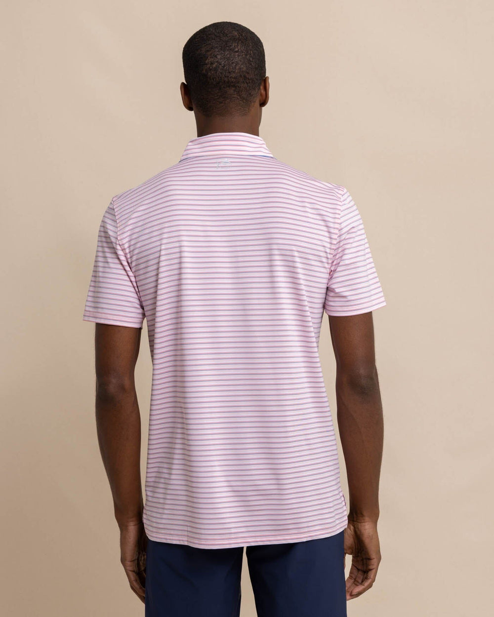 The back view of the Southern Tide Driver Carova Stripe Polo Shirt by Southern Tide - Light Pink
