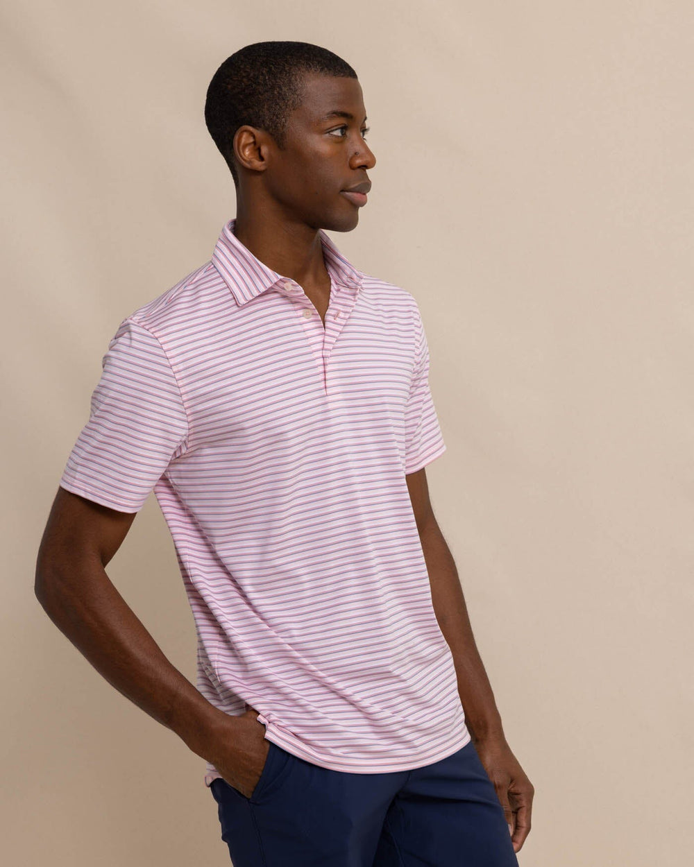 The front view of the Southern Tide Driver Carova Stripe Polo Shirt by Southern Tide - Light Pink
