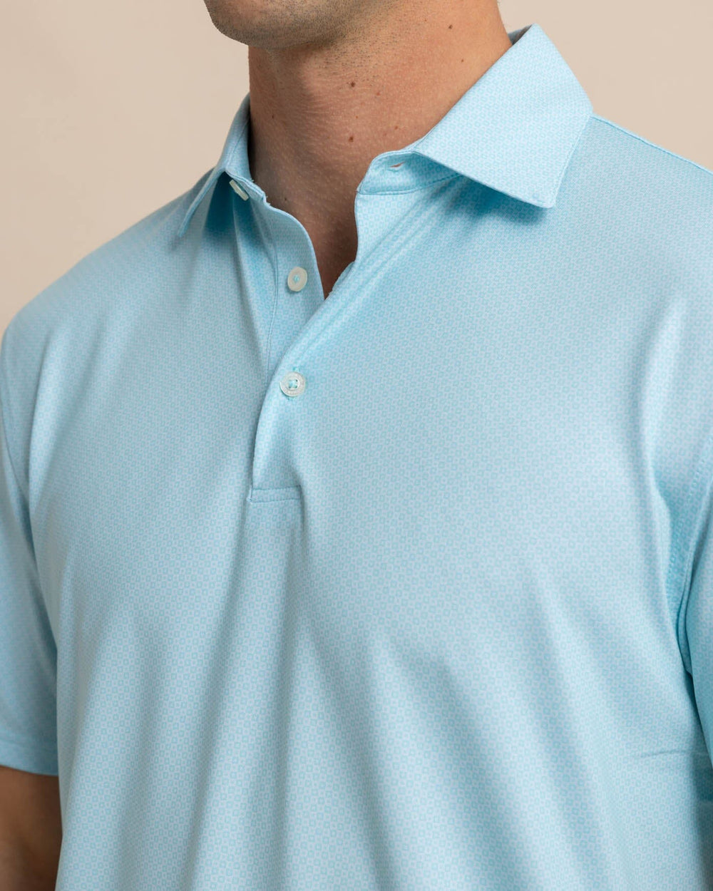 The detail view of the Southern Tide Driver Coastal Geo Polo Shirt by Southern Tide - Chilled Blue