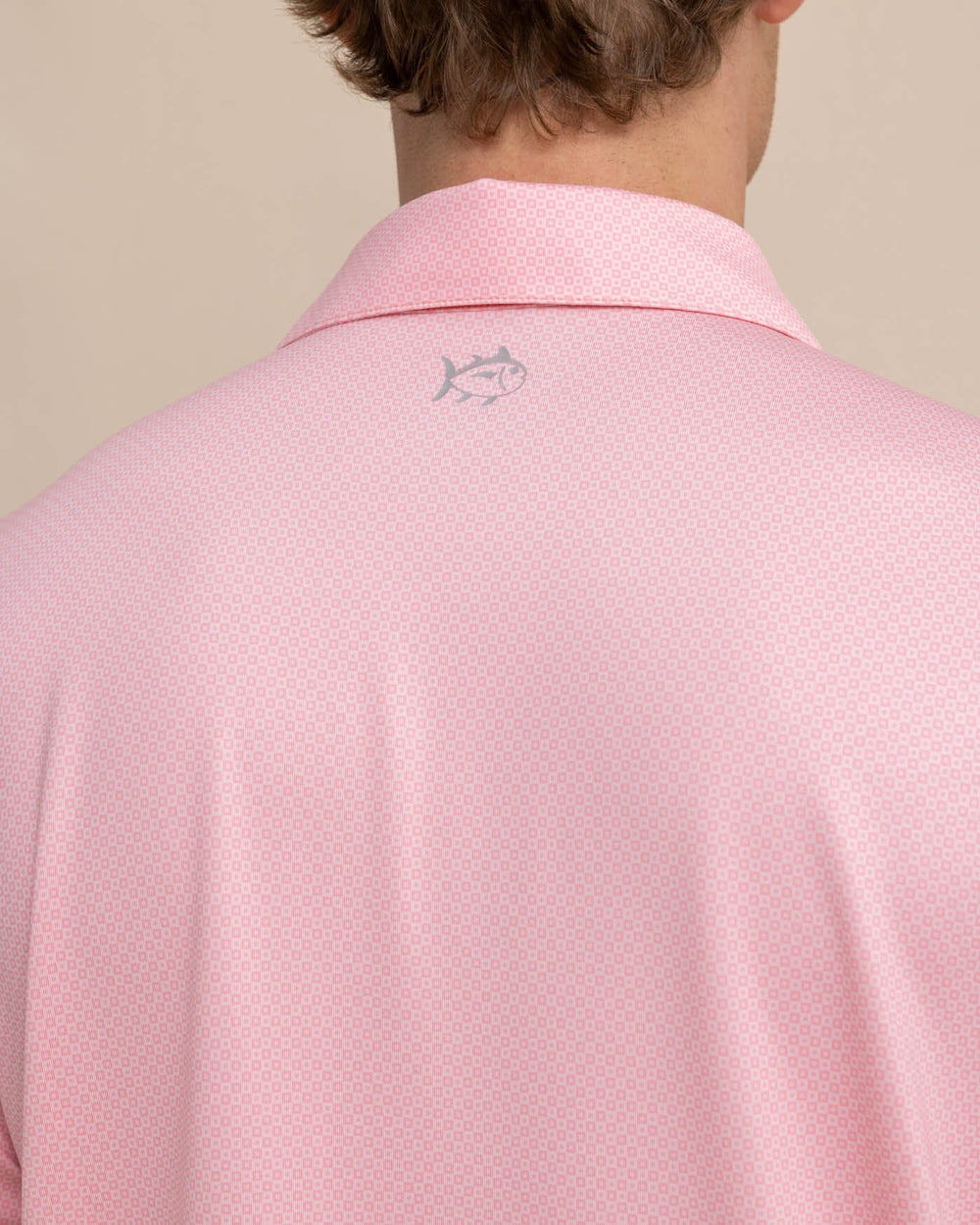 The detail view of the Southern Tide Driver Coastal Geo Polo Shirt by Southern Tide - Flamingo Pink