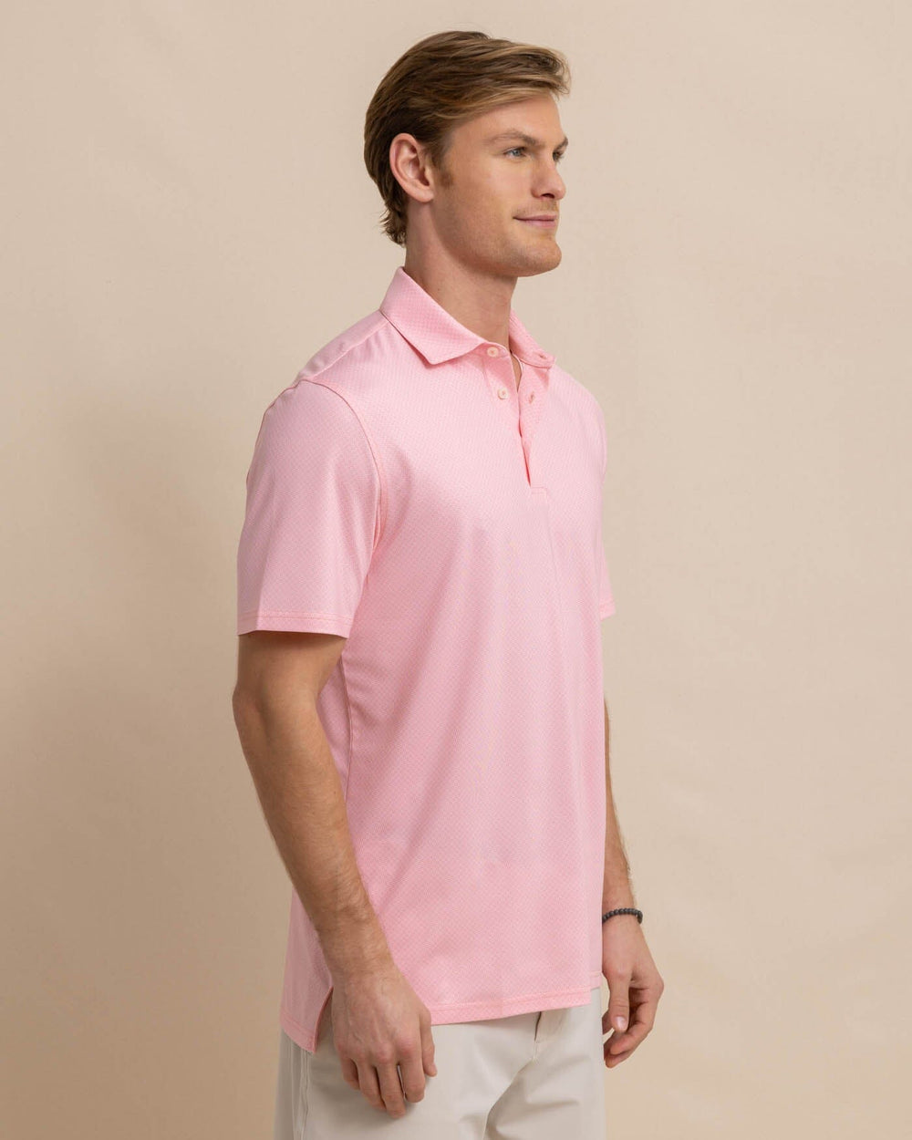 The front view of the Southern Tide Driver Coastal Geo Polo Shirt by Southern Tide - Flamingo Pink