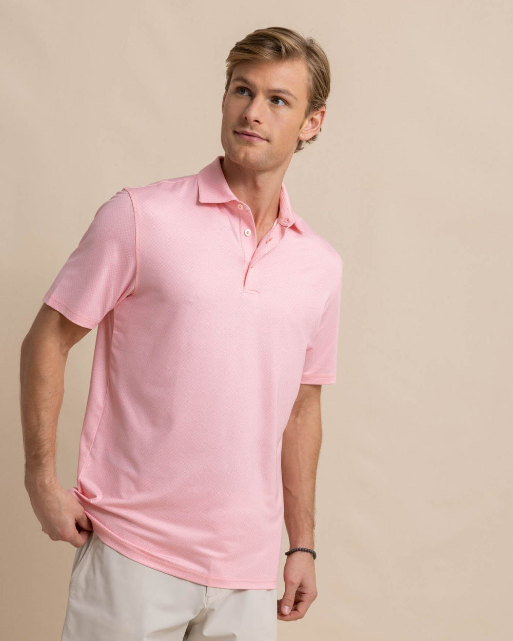 The front view of the Southern Tide Driver Coastal Geo Polo Shirt by Southern Tide - Flamingo Pink