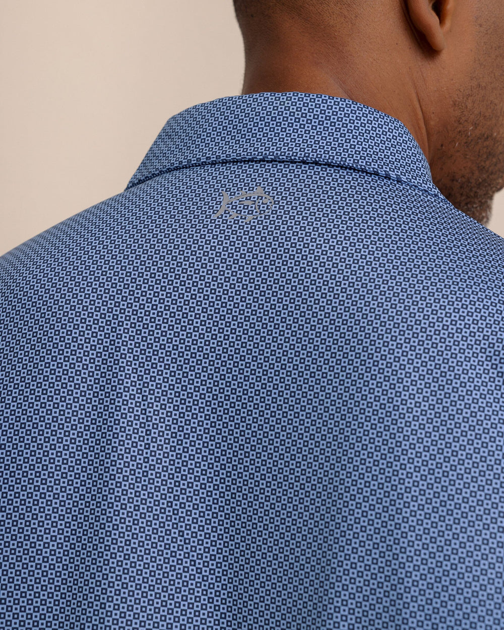 The detail view of the Southern Tide Driver Coastal Geo Printed Polo by Southern Tide - Ocean Channel