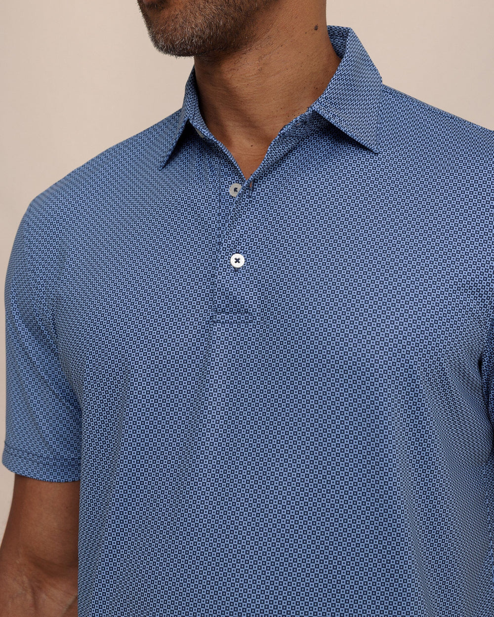 The detail view of the Southern Tide Driver Coastal Geo Printed Polo by Southern Tide - Ocean Channel