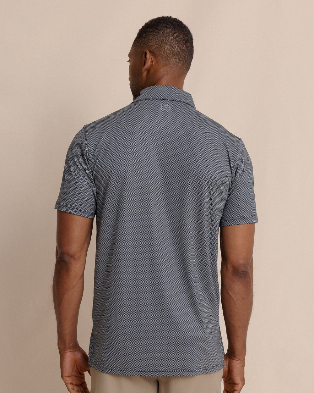 The back view of the Southern Tide Driver Coastal Geo Printed Polo by Southern Tide - Steel