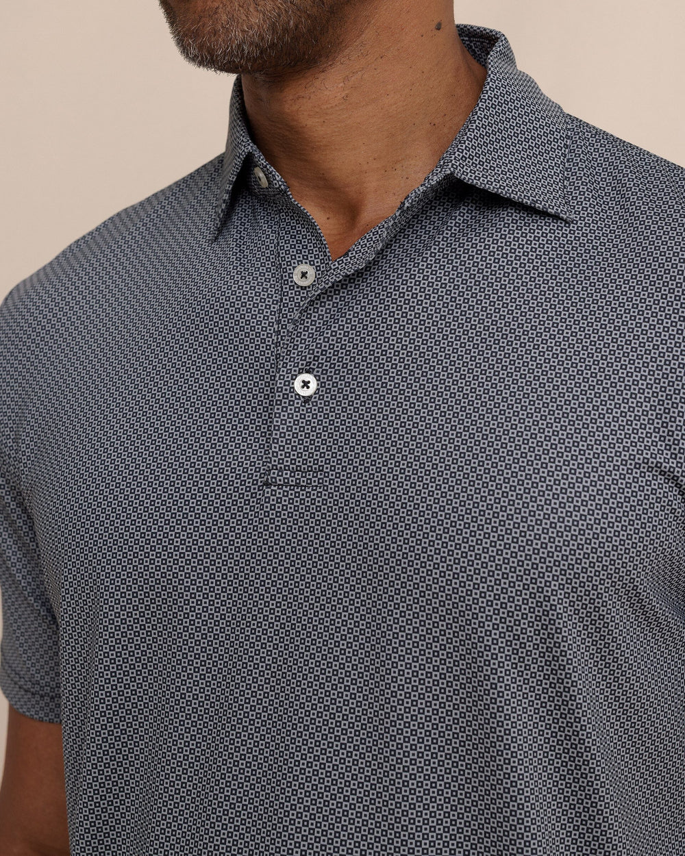 The detail view of the Southern Tide Driver Coastal Geo Printed Polo by Southern Tide - Steel