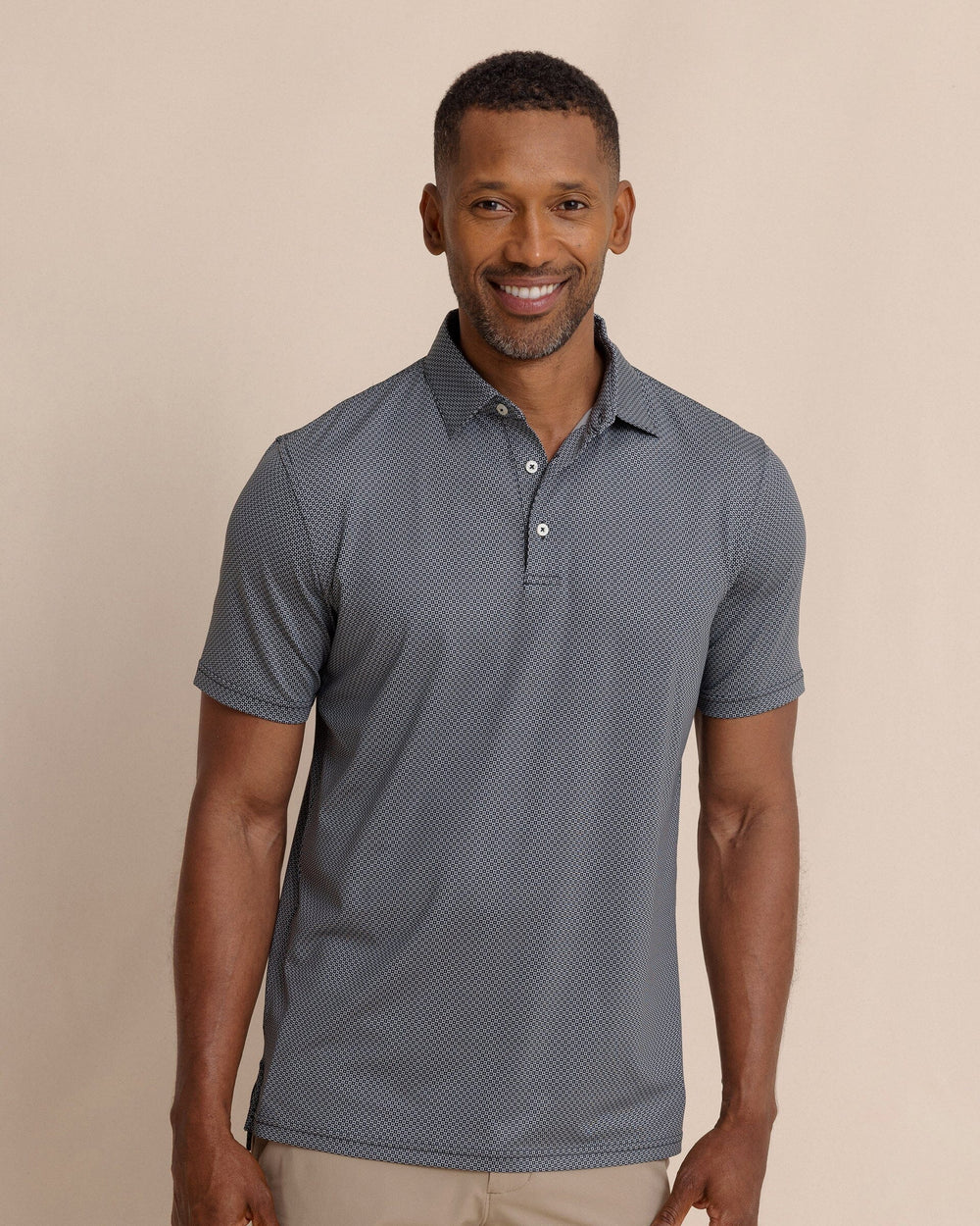The front view of the Southern Tide Driver Coastal Geo Printed Polo by Southern Tide - Steel