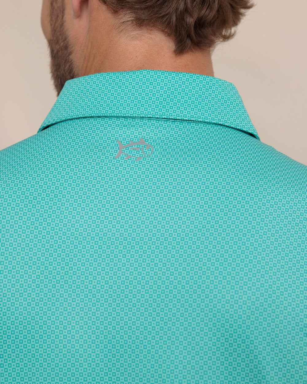 The detail view of the Southern Tide Driver Coastal Geo Printed Polo by Southern Tide - Turtle Green