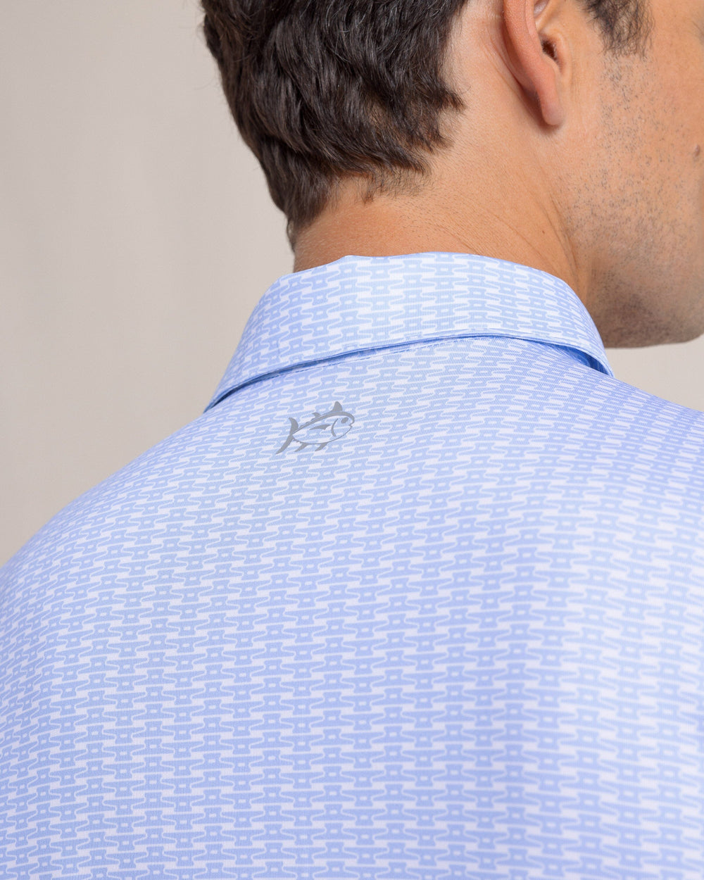 The back detail view of the Southern Tide Driver Dock Cleat Geo Polo by Southern Tide - Sand White