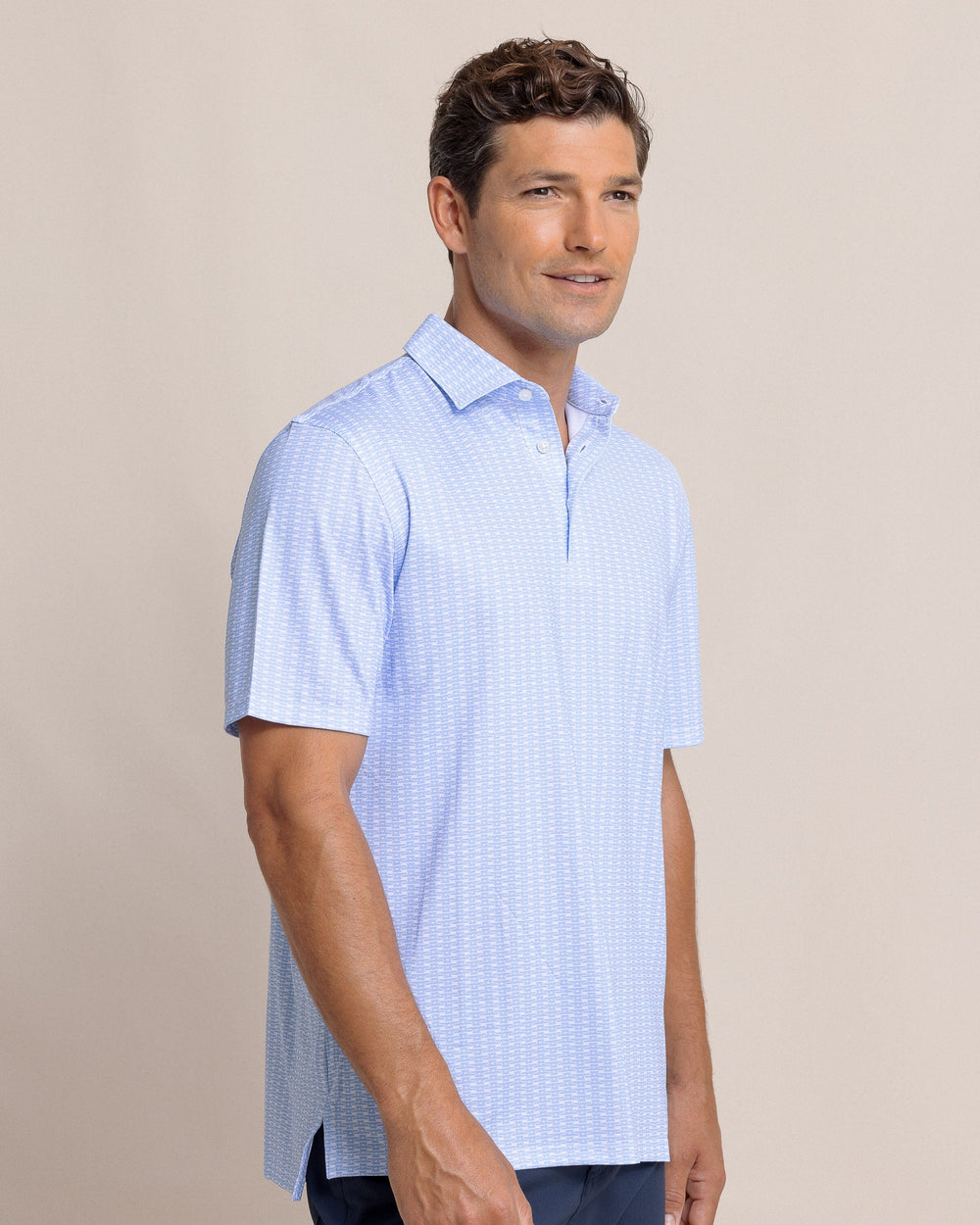 The side view of the Southern Tide Driver Dock Cleat Geo Polo by Southern Tide - Sand White