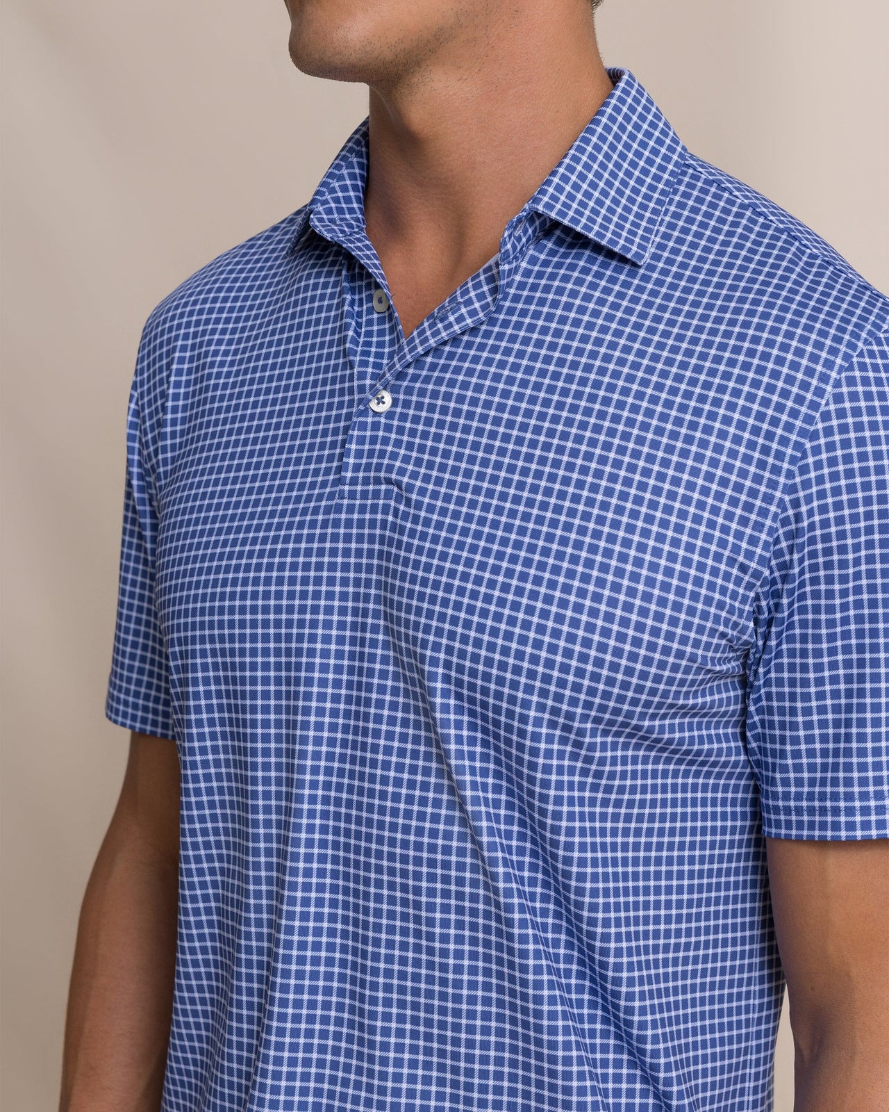 The detail view of the Southern Tide Driver Dunes Edge Plaid Polo by Southern Tide - Nautical Blue