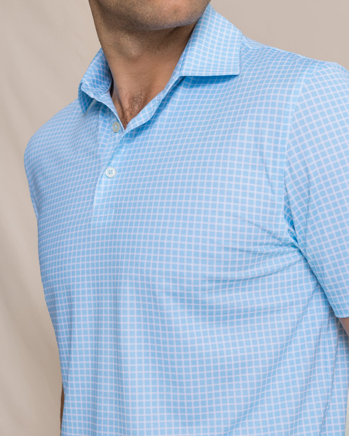 The detail view of the Southern Tide Driver Dunes Edge Plaid Polo by Southern Tide - Tropical Breeze Blue