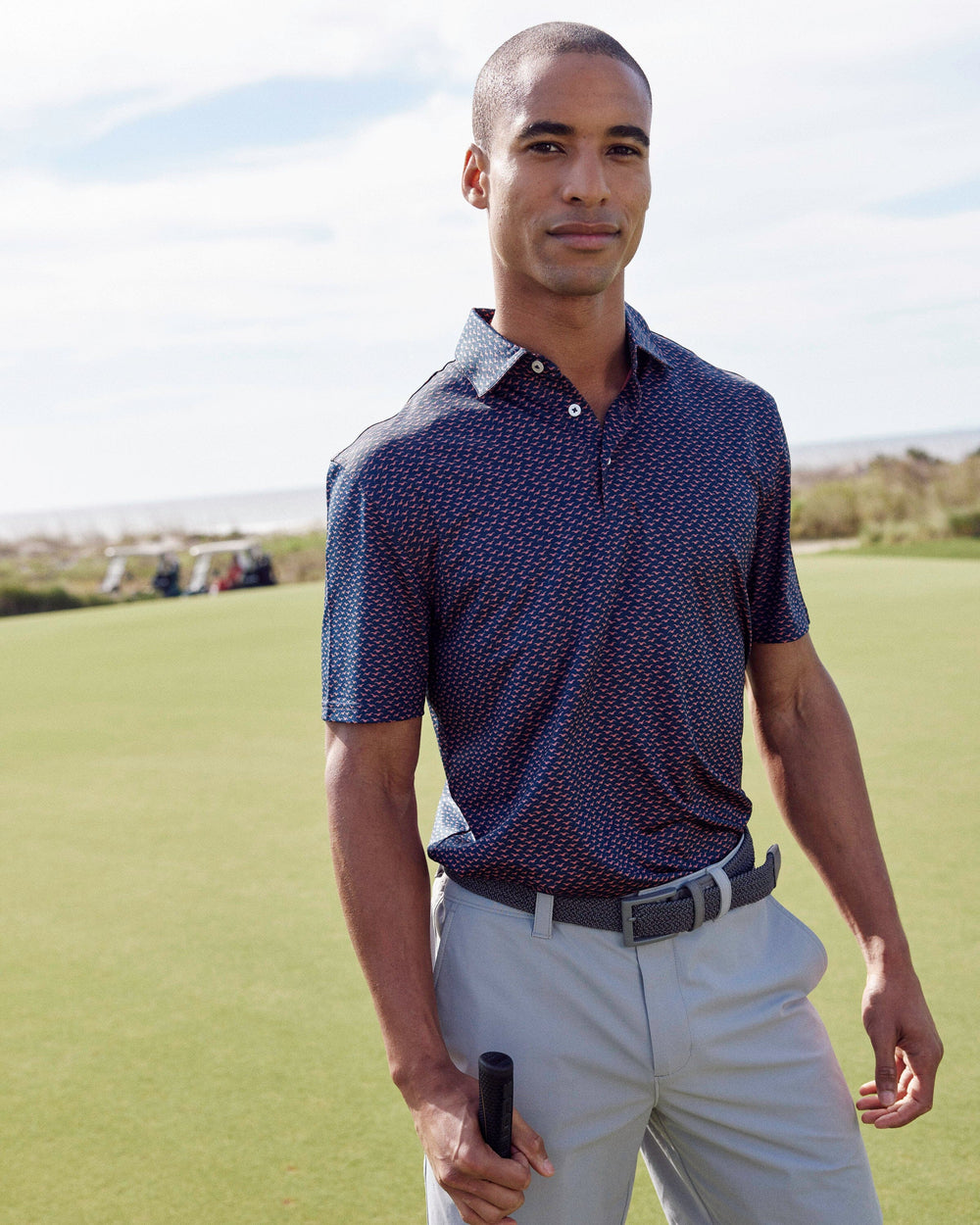 The lifestyle view of the Southern Tide Driver Fall Flock Polo by Southern Tide - Dress Blue