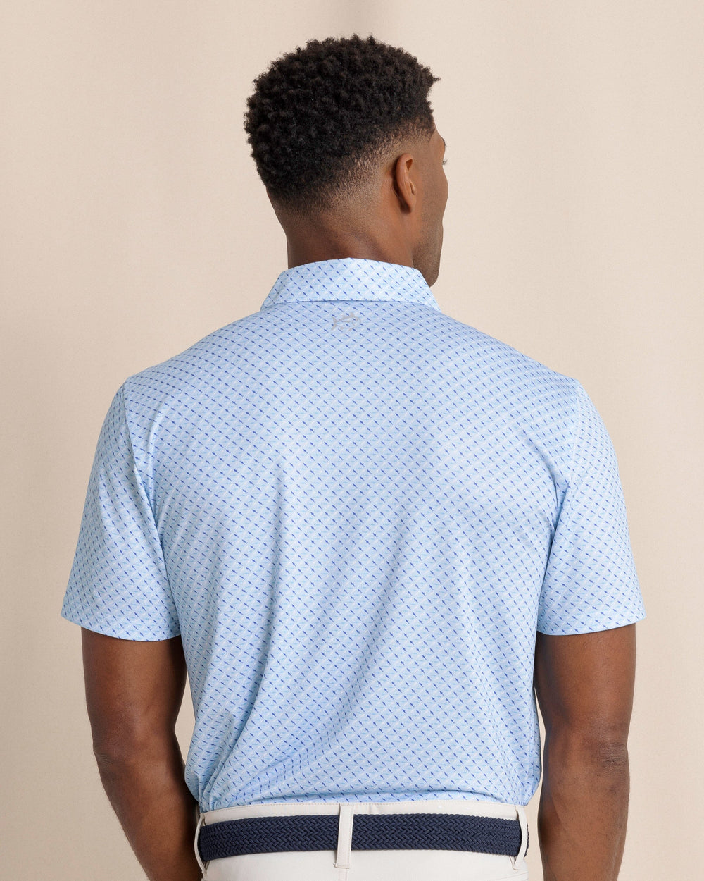 The back view of the Southern Tide Driver Fin-tastic Catch Printed Polo by Southern Tide - Cerulean