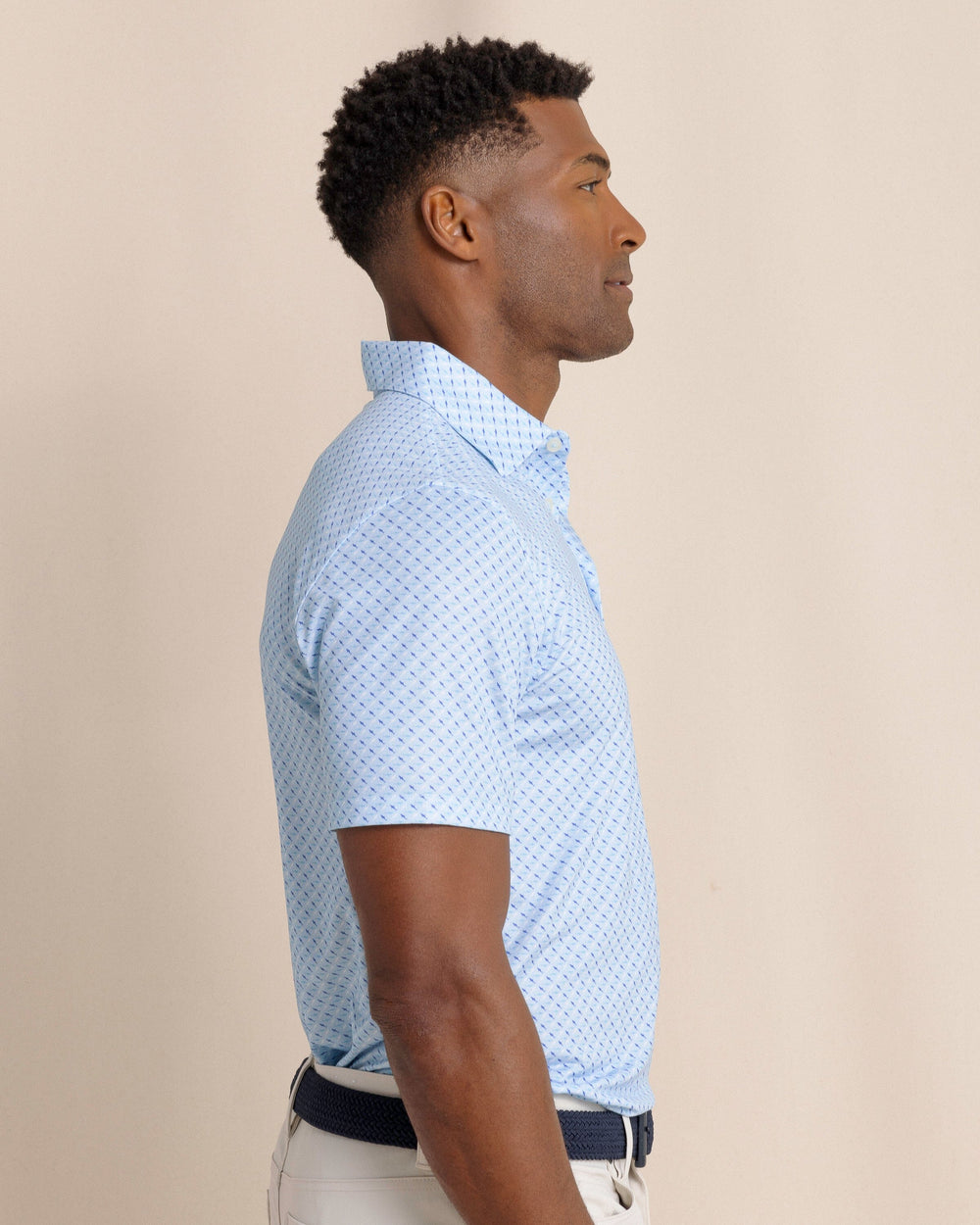 The side view of the Southern Tide Driver Fin-tastic Catch Printed Polo by Southern Tide - Cerulean