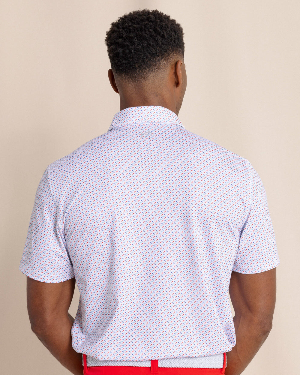 The back view of the Southern Tide Driver Fin-tastic Catch Printed Polo by Southern Tide - Classic White