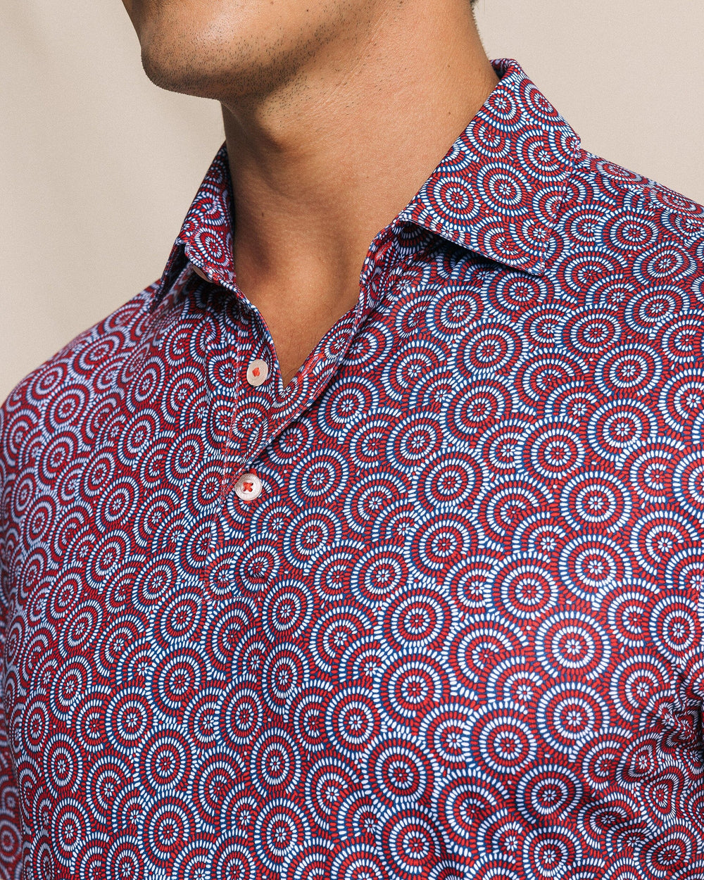 The detail view of the Southern Tide Driver Fireworks Printed Polo by Southern Tide - Channel Marker Red
