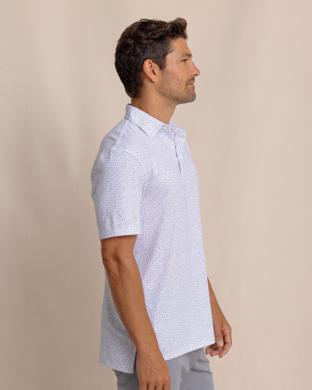 The side view of the Southern Tide Driver Gameplay Polo by Southern Tide - Classic White