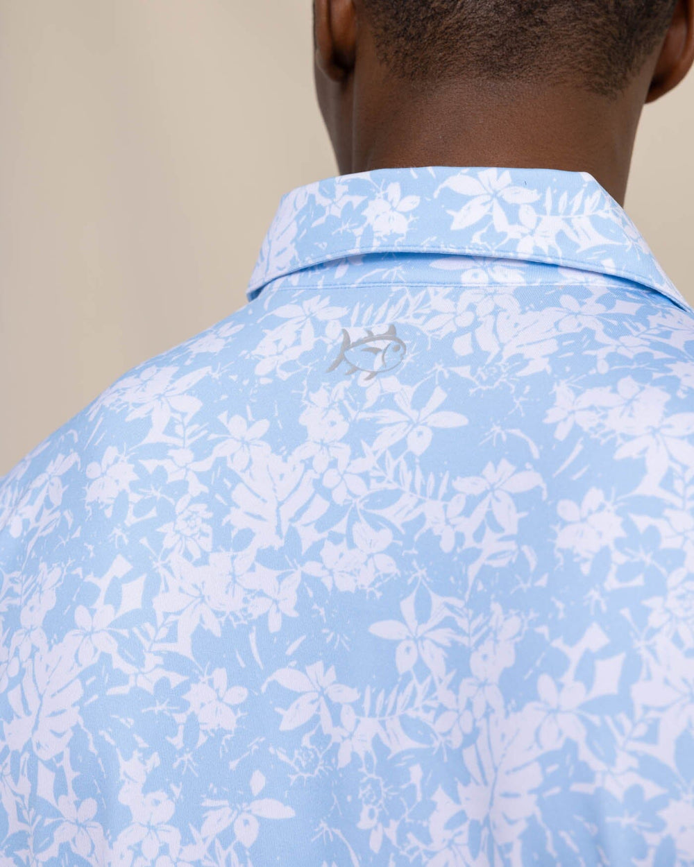 The detail view of the Southern Tide Driver Island Blooms Printed Polo by Southern Tide - Clearwater Blue