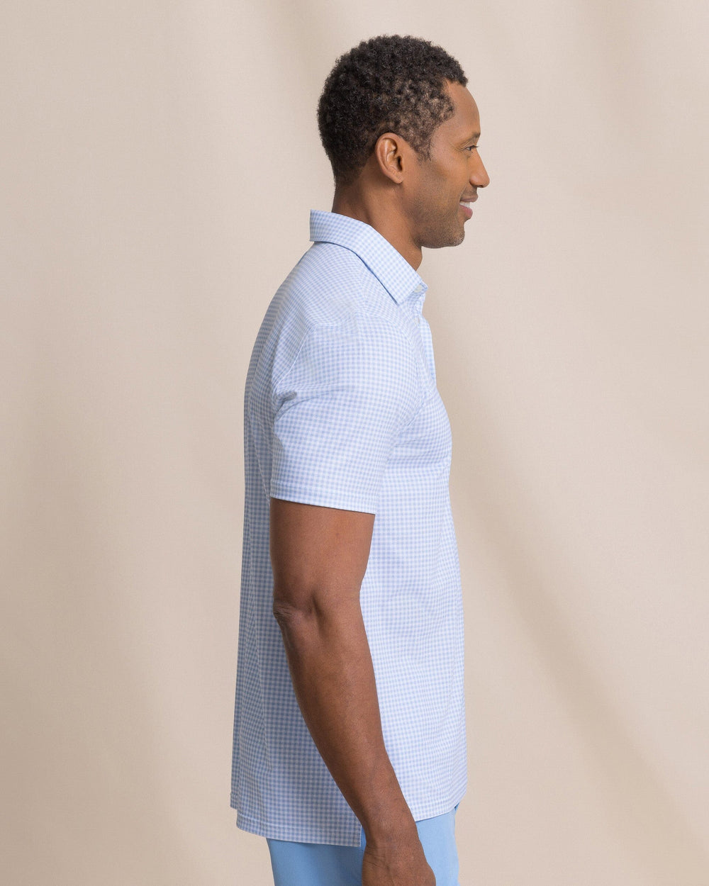 The side view of the Southern Tide Driver Island View Gingham Printed Polo by Southern Tide - Tide Blue