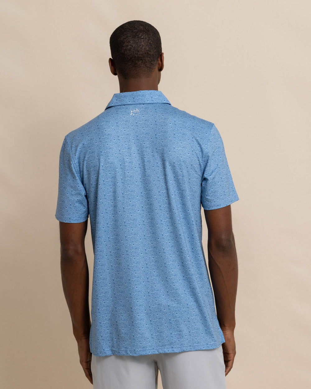 The back view of the Southern Tide Driver Let's Go Clubbing Printed Polo by Southern Tide - Coronet Blue