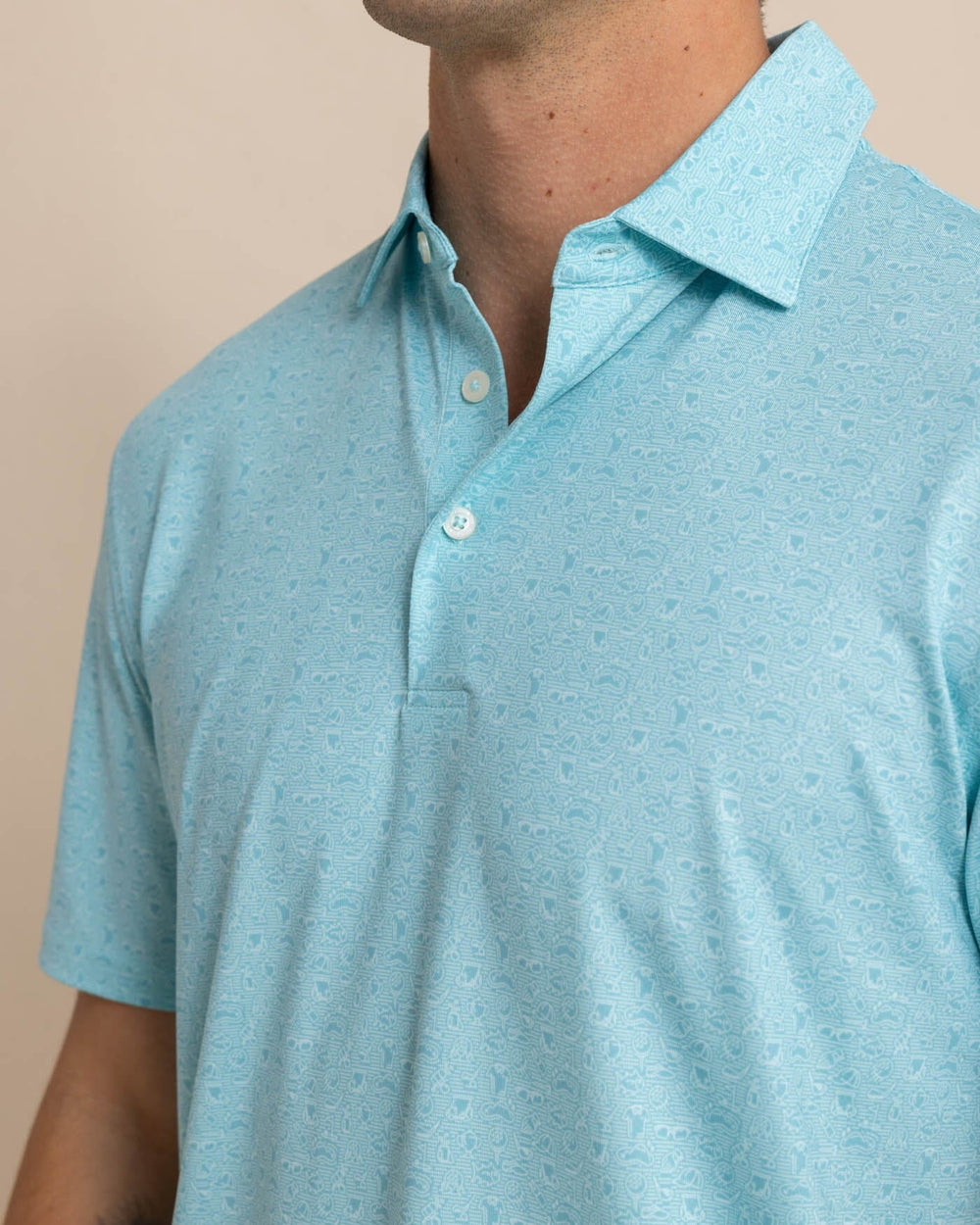 The detail view of the Southern Tide Driver Let's Go Clubbing Printed Polo by Southern Tide - Ocean Aqua