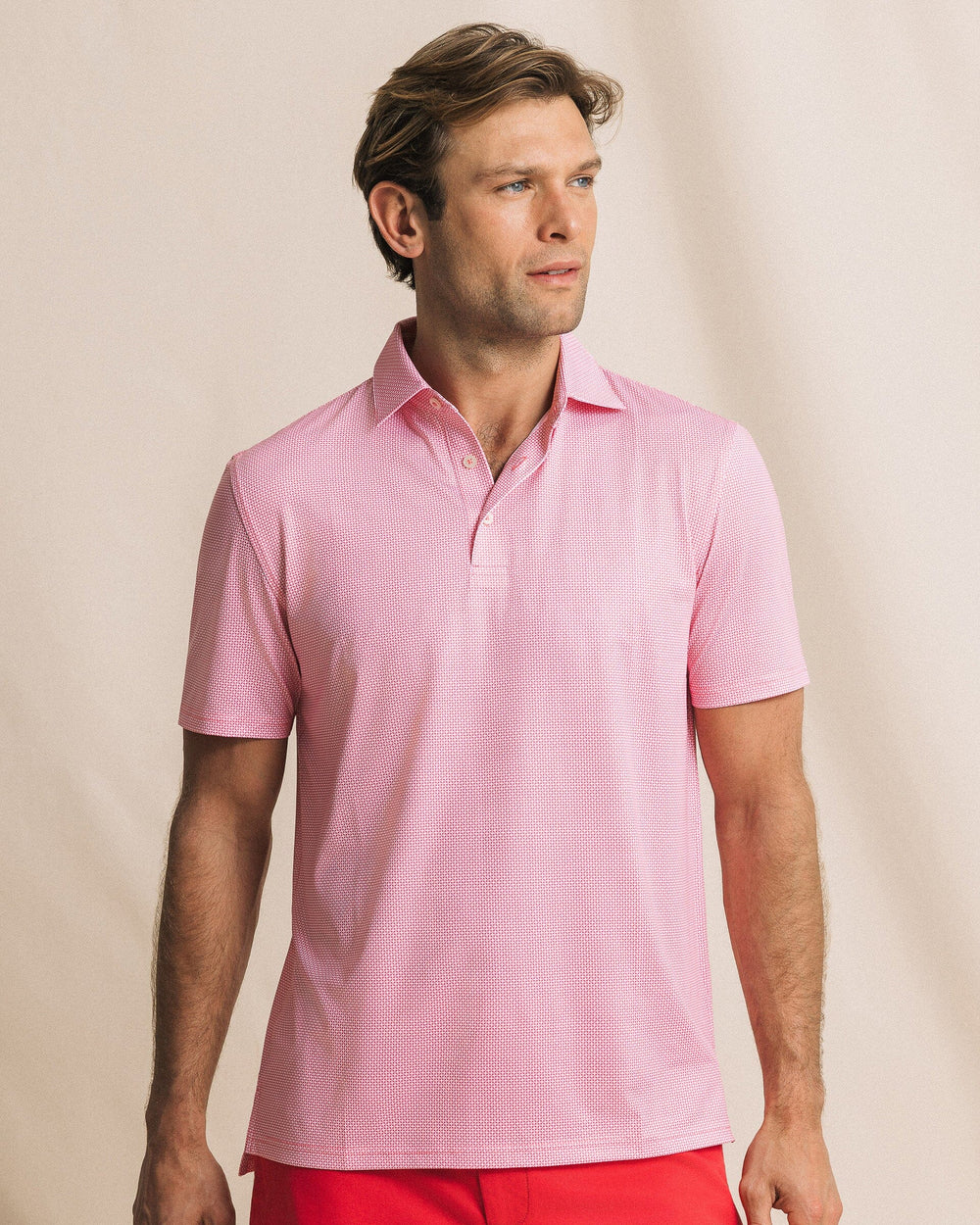 The front view of the Southern Tide Driver Ocean Vista Printed Polo by Southern Tide - Island Pink