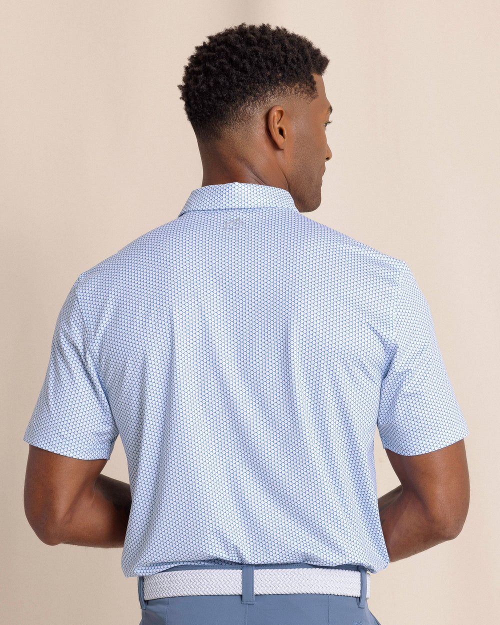 The back view of the Southern Tide Driver On The Ball Printed Polo by Southern Tide - Blue Lolite