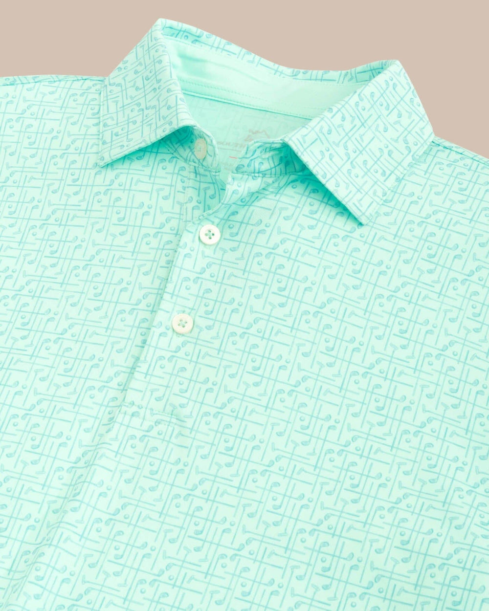 The detail view of the Southern Tide Driver Over Clubbing Print Performance Polo Shirt by Southern Tide - Baltic Teal
