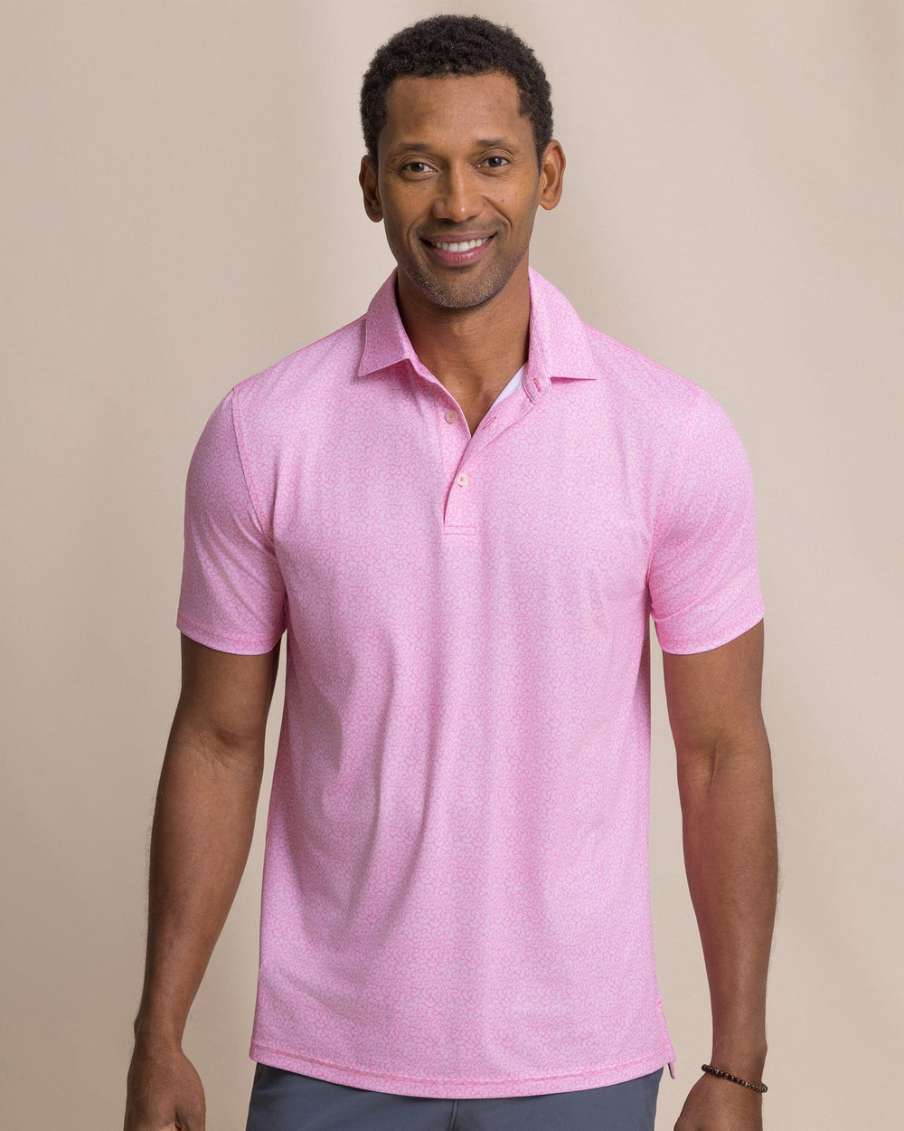 The front view of the Southern Tide Driver Paradise Shores Printed Polo by Southern Tide - Orchid Pink
