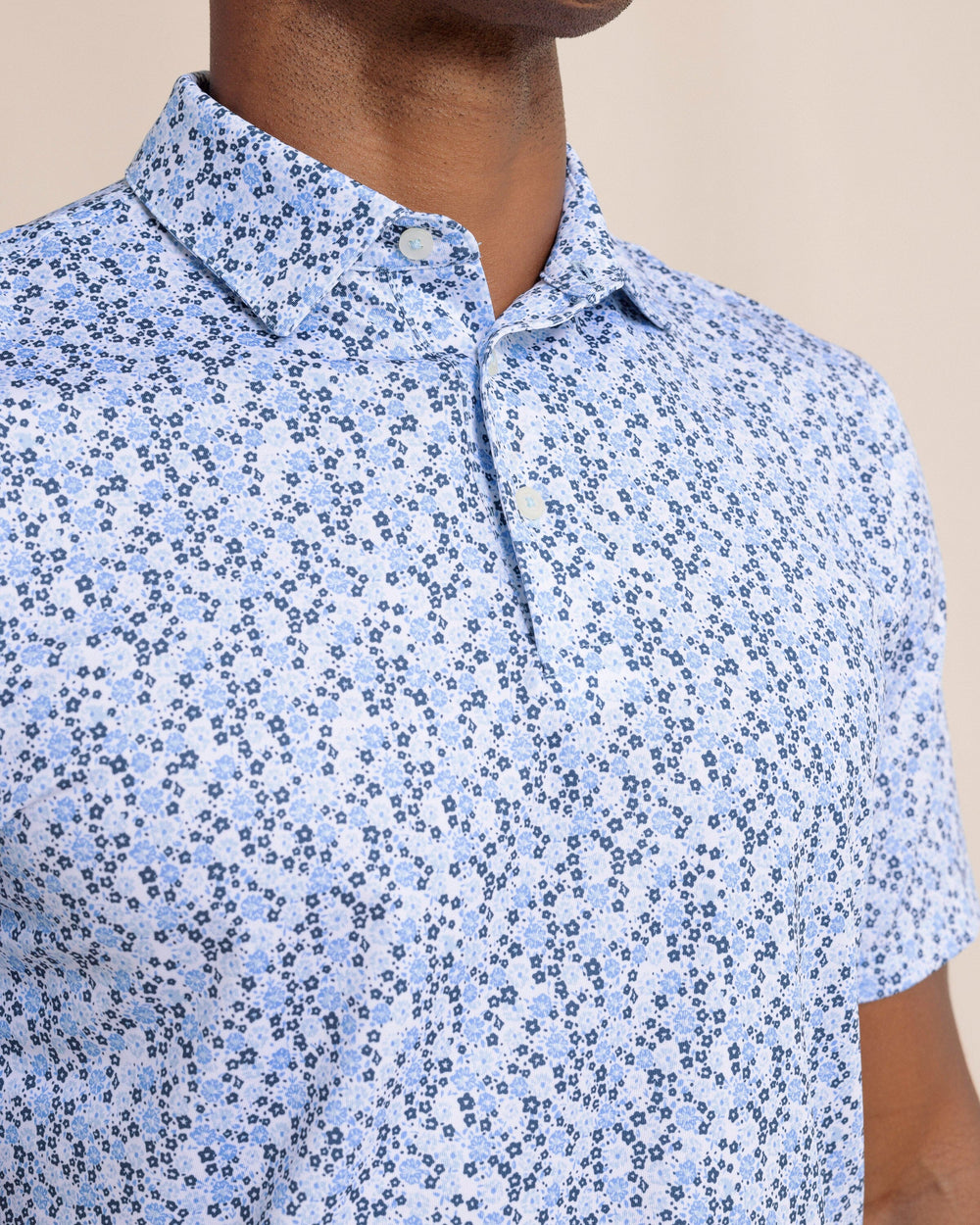 The front detail view of the Southern Tide Driver Petal Party Printed Polo by Southern Tide - Classic White