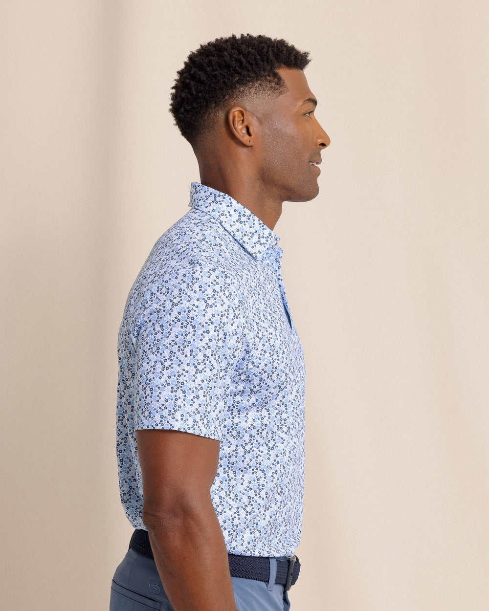 The side view of the Southern Tide Driver Petal Party Printed Polo by Southern Tide - Classic White