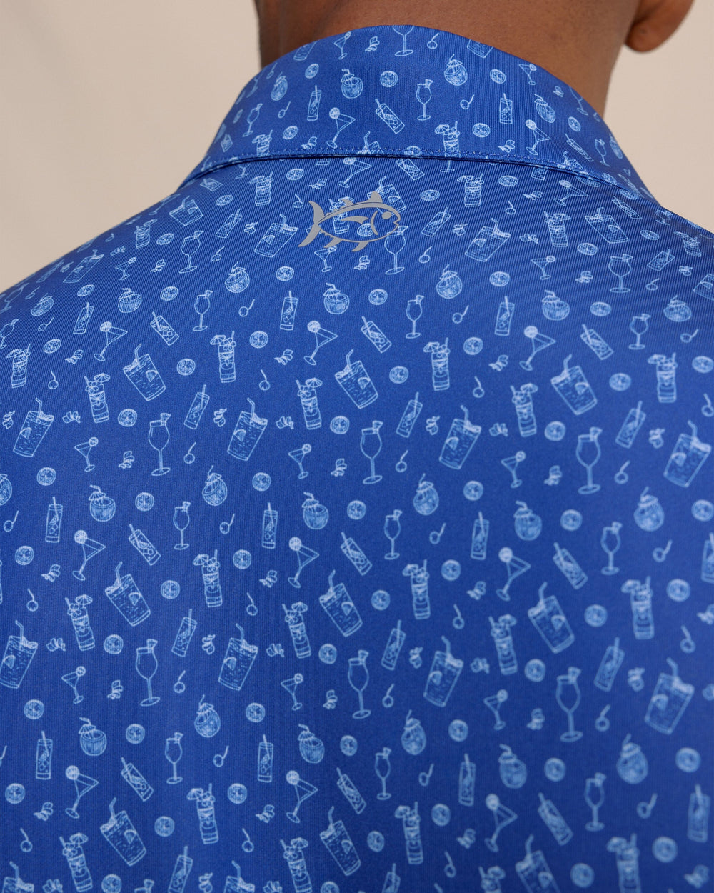 The detail view of the Southern Tide Driver Pour Decisions Printed Polo by Southern Tide - Surf Blue